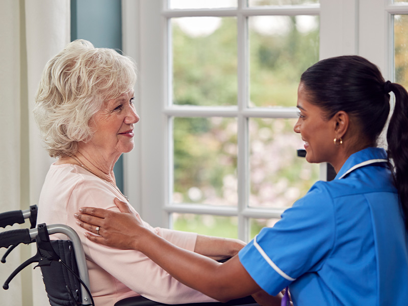Friendly caregiver providing support